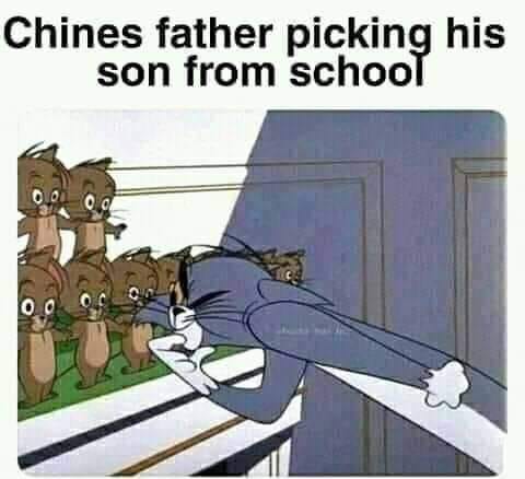 Chines father picking his son from school