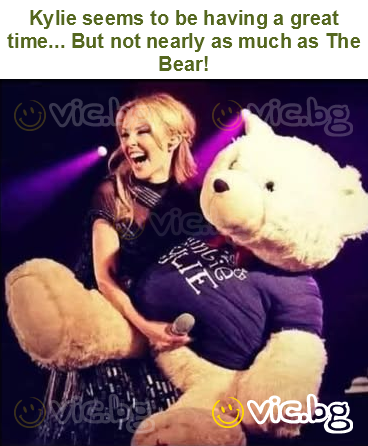 Kylie seems to be having a great time... But not nearly as much as The Bear!